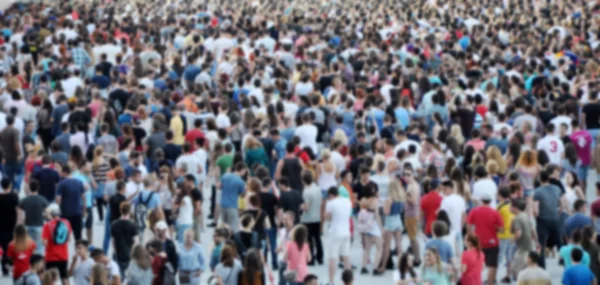 Blurred crowd of people partying