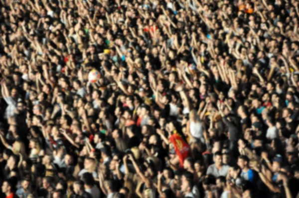 Blurred crowd of people partying