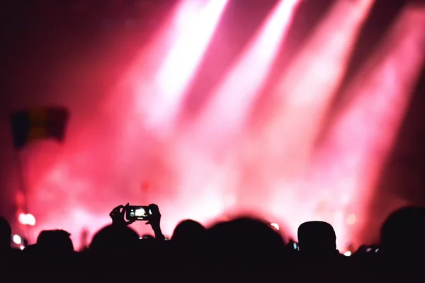 Crowd recording live concert with smart phones