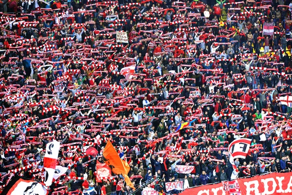 Romanian football fans in a stadium