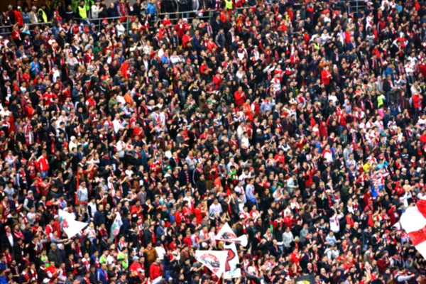 Blurred crowd of people in a stadium