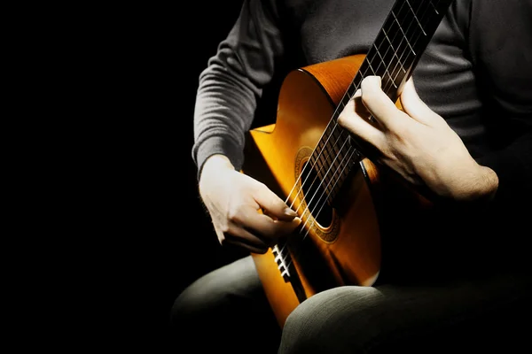 Acoustic guitar hands guitarist