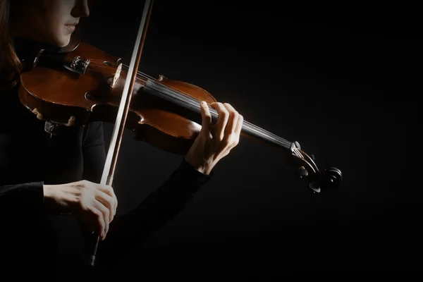 Violin player violinist hands closeup