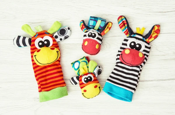 Colorful hand puppets and wrist pals, funny toys