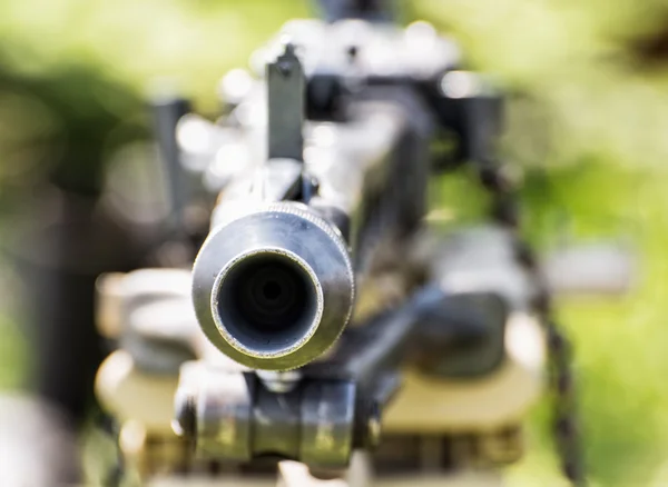 Close up photo of historical loaded machine gun, World War II