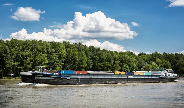 Cargo ship with containers on the Danube river, Slovakia