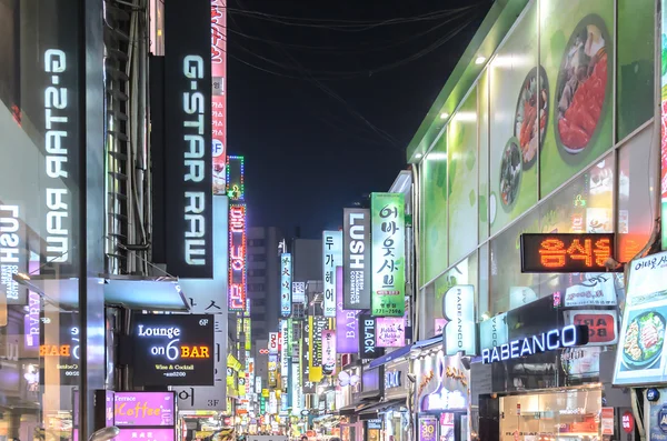 SEOUL - FEBRUARY 14: Myeong-Dong Neon Lights February 14, 2013 in Seoul, South Korea. The location is the premiere district for shopping in the city.