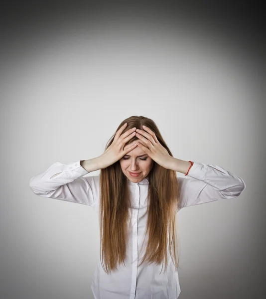 Sad and Unhappy woman in white is crying.