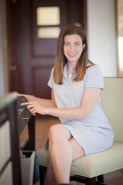 Woman sitting on chair