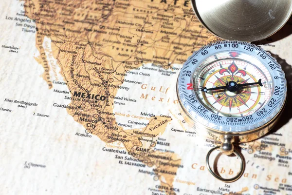 Travel destination Mexico, ancient map with vintage compass