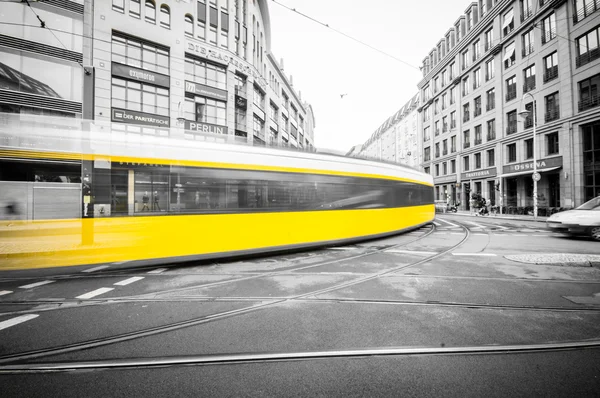 BERLIN, GERMANY - SEPTEMBER 18: typical yellow tram on September 18, 2013 in Berlin, Germany. The tram in Berlin is one of the oldest tram systems in the world.