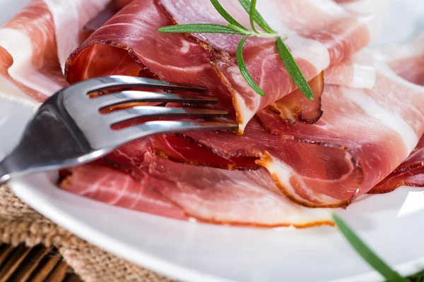 Sliced Ham on white plate