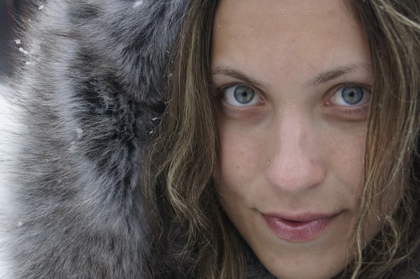 Fur coat woman face
