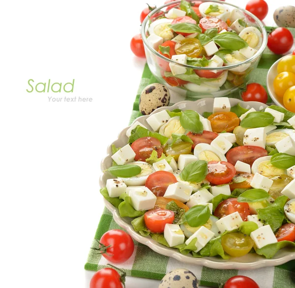 Vegetarian salad with cherry tomatoes, eggs and cheese