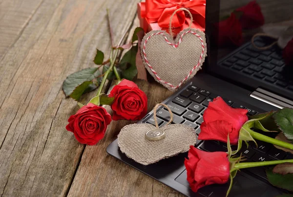Computer and roses