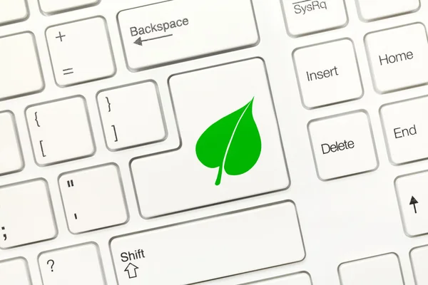 White conceptual keyboard - Key with green leaf symbol