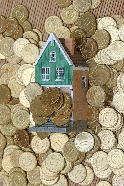 Coins over house