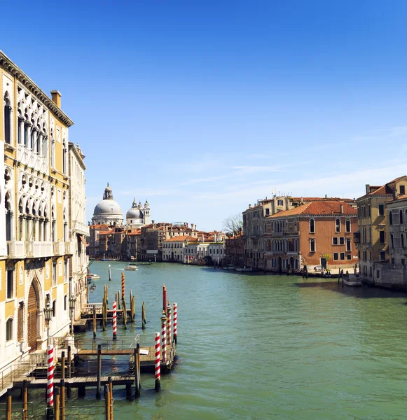 Beautiful view of Venice Grand Canal. sunny day landscape with historical houses, traditional Gondola boats and colorful buildings. Italy voyage destination scenic. famous European Union places