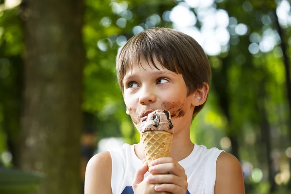 Little boy eating an ice cream