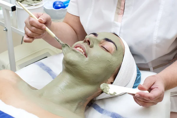 Woman during facial procedure