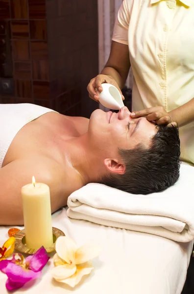 Man enjoying spa treatment