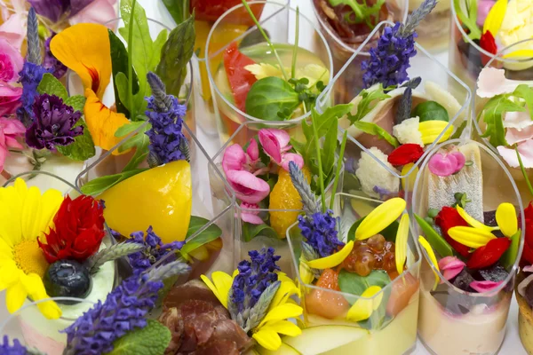 Canapes with edible flowers