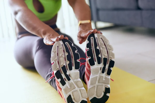 Home Fitness Black Woman Doing Workout Stretching On Pad