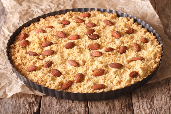 Italian almond cake Sbrisolona close up in baking dish. horizon