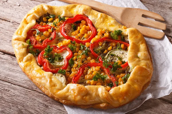 Homemade vegetable pie on a table close-up. horizontal top view