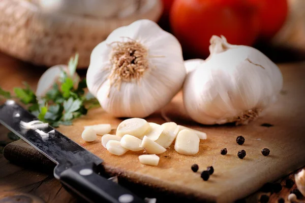 Fresh garlic on wooden table