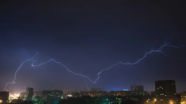 Night sky with lightning over the city