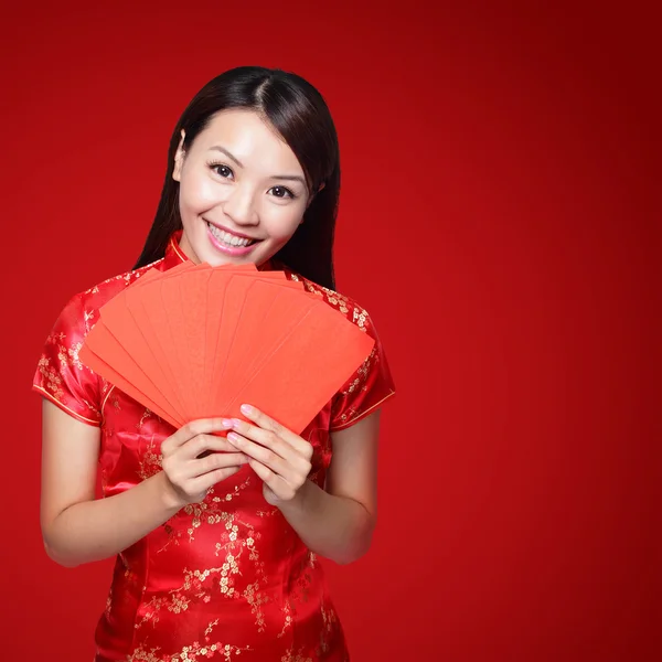 Woman holding red envelopes
