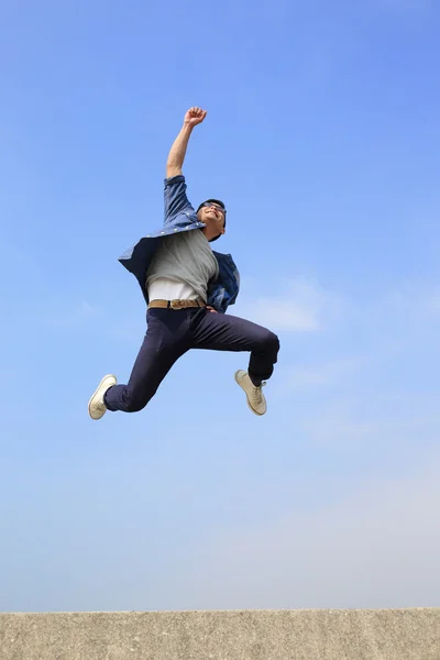 Happy man jumping