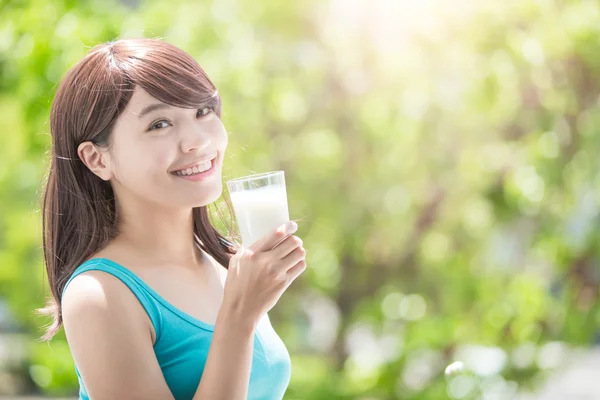Young Woman drinking milk