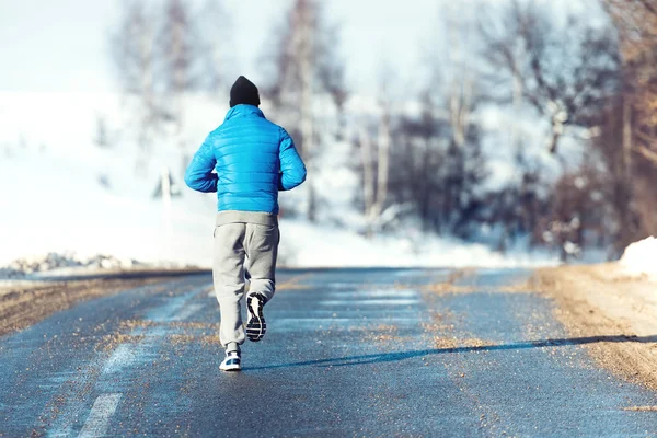 Fitness man, jogger running, preparing and training outdoor