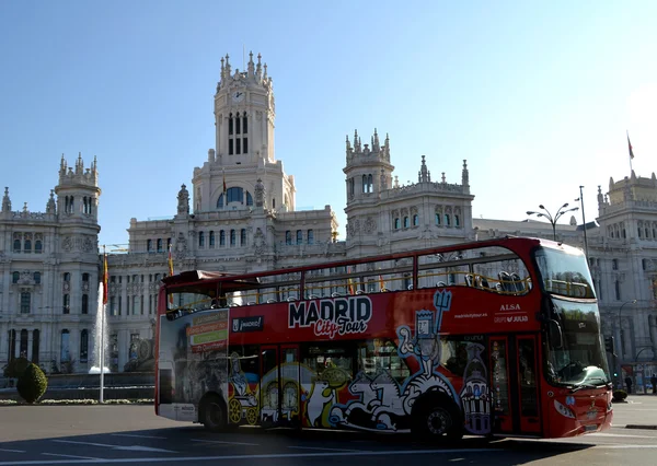 Tourist bus in Cibeles Square, Madrid, Spain