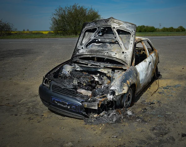 Abandoned car torched set on fire and burnt out