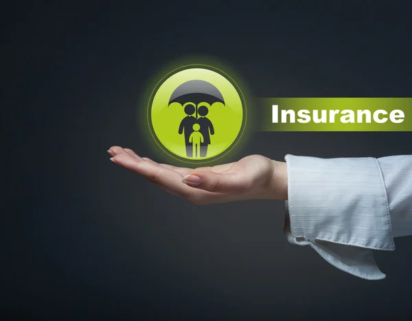 Business insurance concept. Man holding a symbol of life insuran