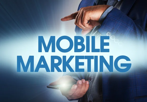 Businessman presses button mobile marketing on virtual screens.