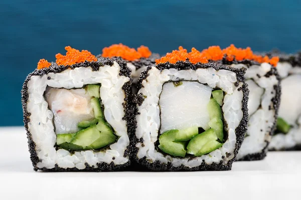 Set of square sushi rolls with white fish, vegs, cream cheese