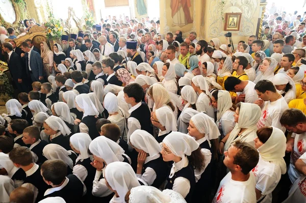 Orel, Russia - July 28, 2016: Russia baptism anniversary Divine Lutirgy. Girls in white shawls waiting for holy communion