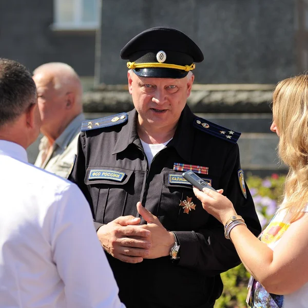 Orel, Russia - August 05, 2016: Orel city day. Sergey Kalashkinov, colonel of FSO giving interview