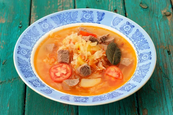 Shchi, traditional Russian cabbage soup with meat, potatoes, bay