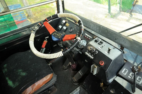 Steering wheel and empty driver\'s seat in trolleybus