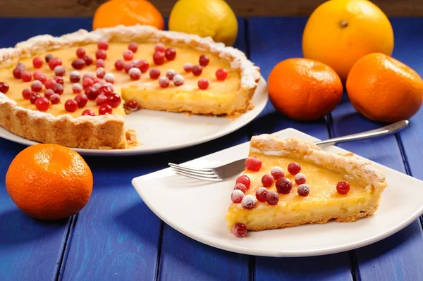 Lemon pie with condensed milk decorated with fresh cranberries o
