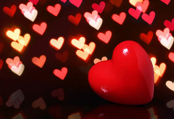 Valentine Red Heart over Bokeh in dark. Valentines Day Card