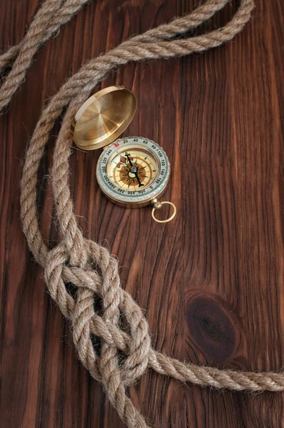 Sailor knot and brass compass