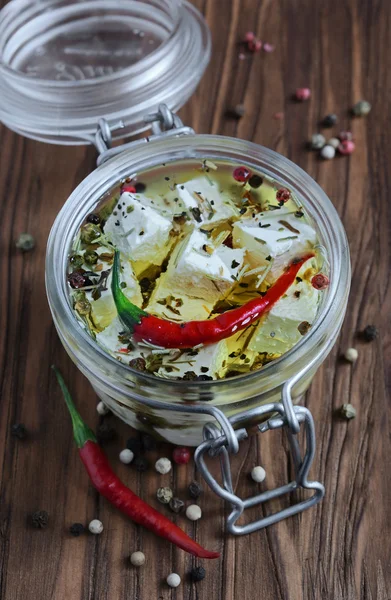 Feta cheese marinated in olive oil with spices