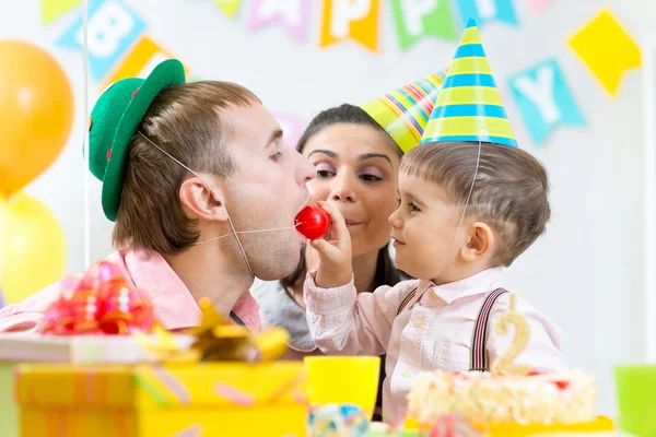 Parents have fun celebrating birthday of kid son