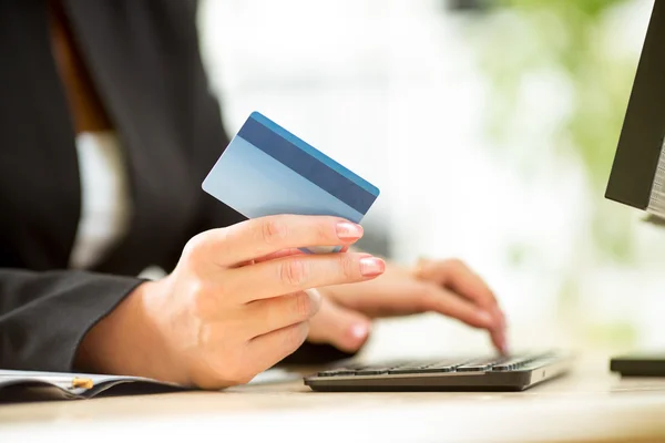 Business woman hands with credit card